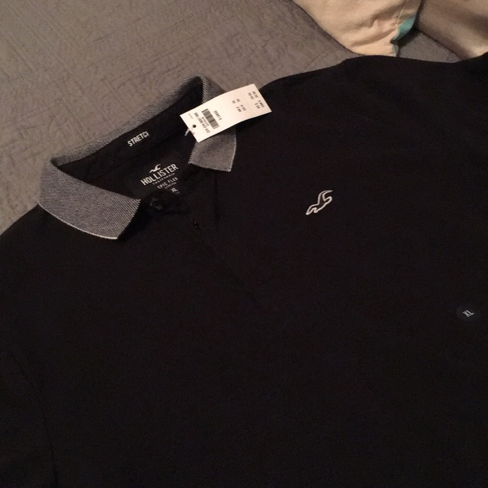 Flex black polo with pattern on collar and sleeve